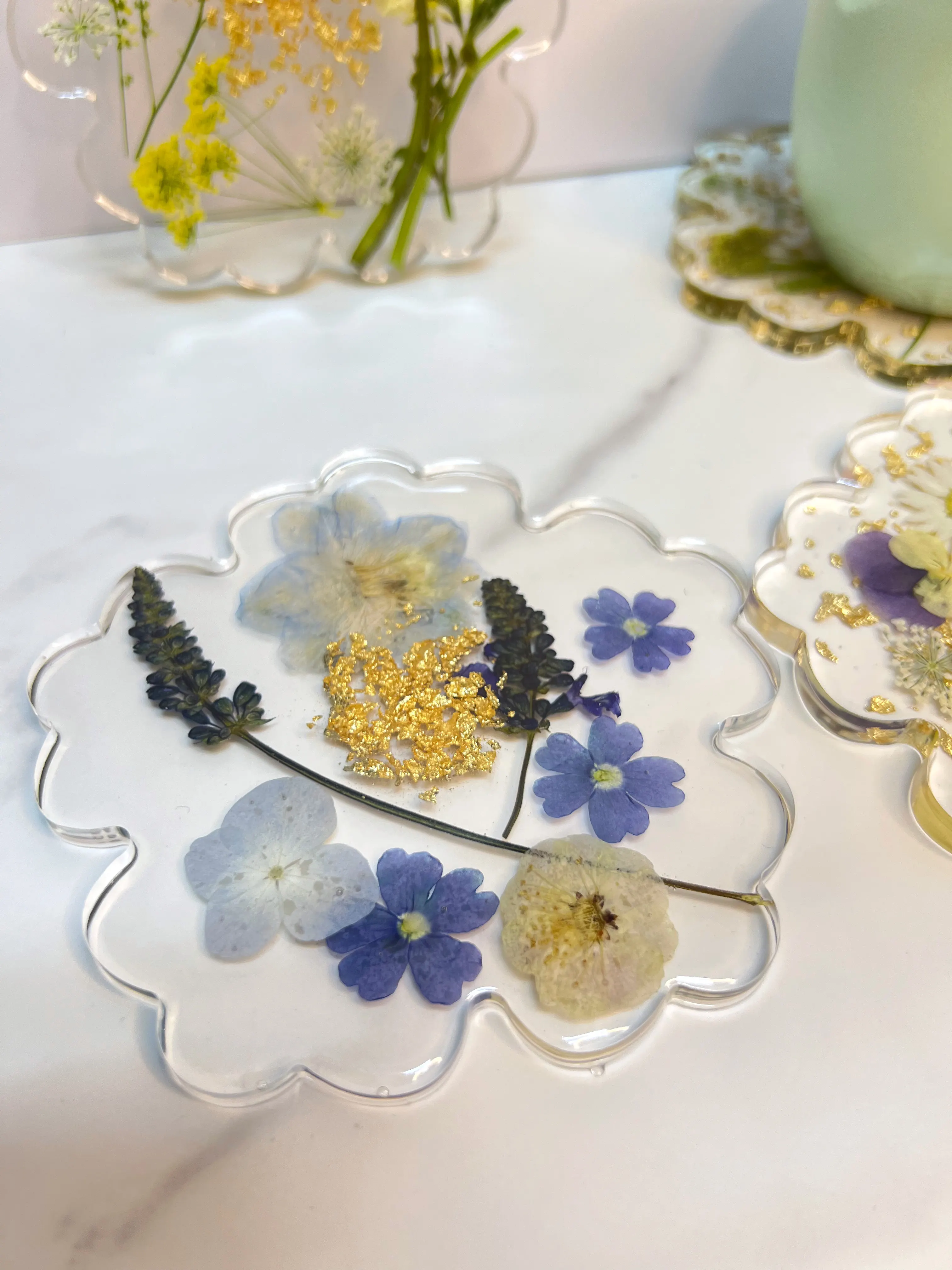 Real hydrangea and lavender blooms preserved in clear resin